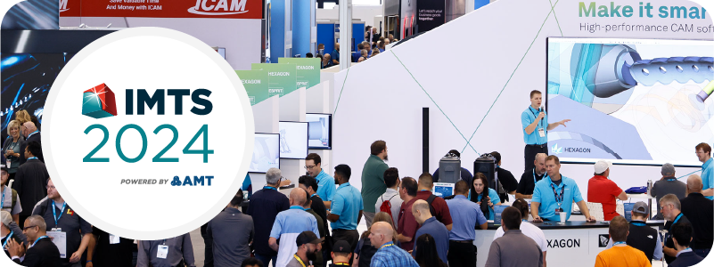 Image of several people walking the IMTS show floor. Several booths are visible, one mostly black with blue lines and another mostly white with a gray design. On the left side is a white circle. Inside the circle it says IMTS 2024, powered by AMT.